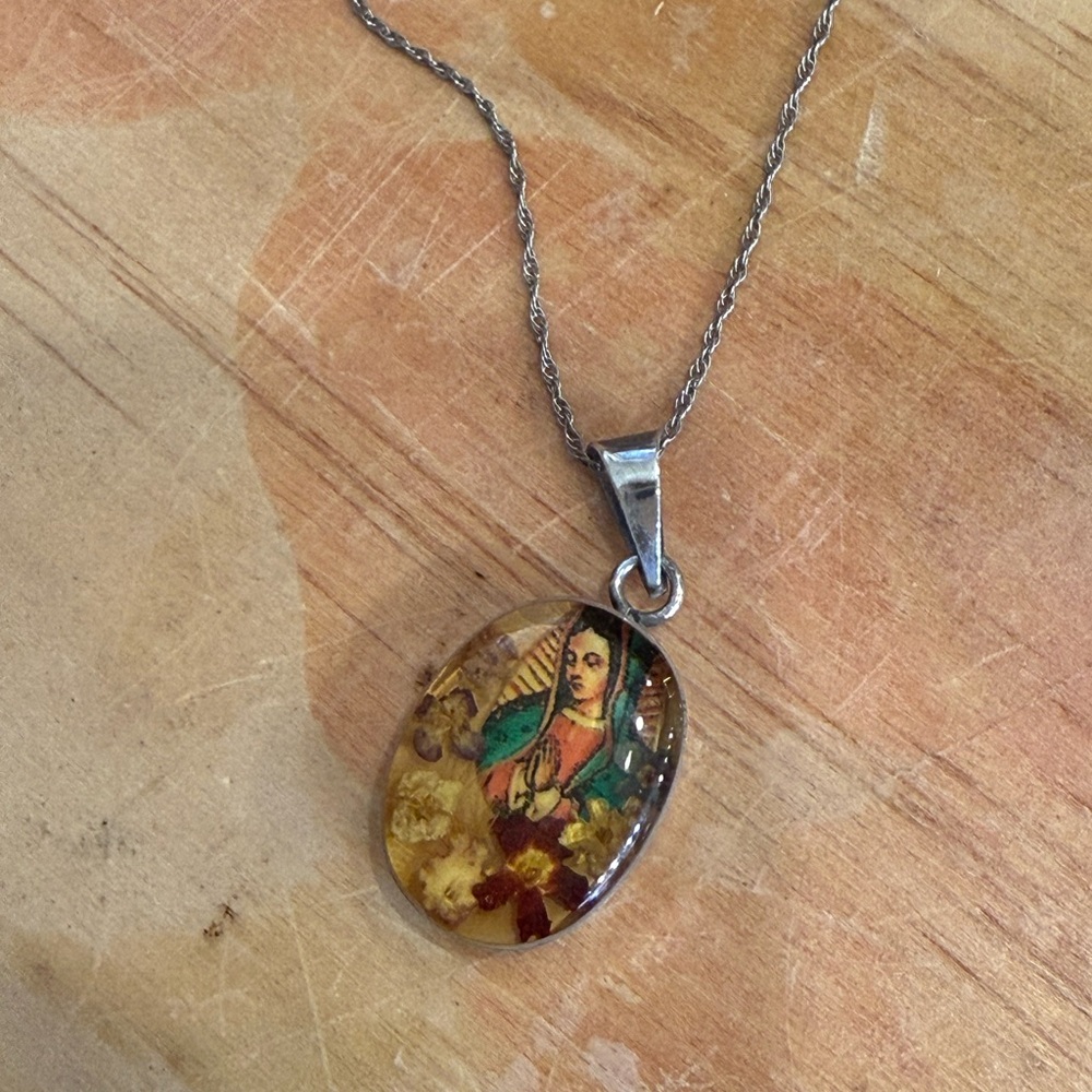 Mother Theresa in Resin Mold with Dried Flowers Detail